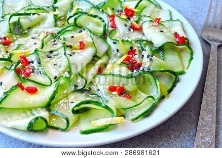 Cucumber Salad In Chinese Style. Salad With Cucumbers And Chili Pepper. Chinese Salad With Cucumber.