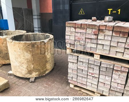 Large Round Concrete Cement Stone Circles Rings Wells And Paving Stone Tiles On Wooden Paddons At A 