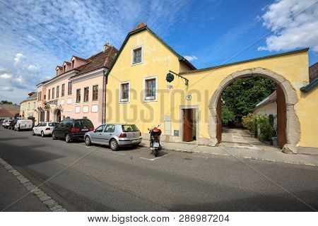 Entrance Gate To The Heuriger Tavern With A Bunch Of Fir Twigs Hanging Above It. Perchtoldsdorf, Moe