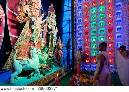 Howrah, West Bengal, India - 5th October 2019 : Hindu Brahmin Priests Arranging To Feed Goddess Durg