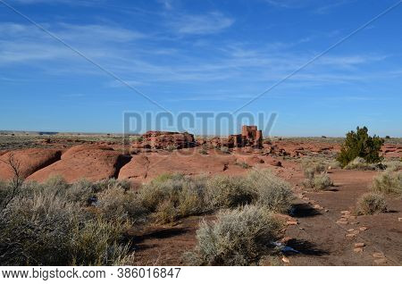 Wukoki Ruins And The Surrounding Red Rock Landscape.