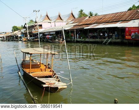 Amphawa, Thailand, January 23, 2016: A Wooden Boat On The Canal Of Amphawa Floating Market