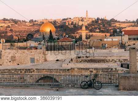 View Of Old Jerusalem From The Mount. View Of Old City From The Roof, With Lattice And Bicycle On Fo