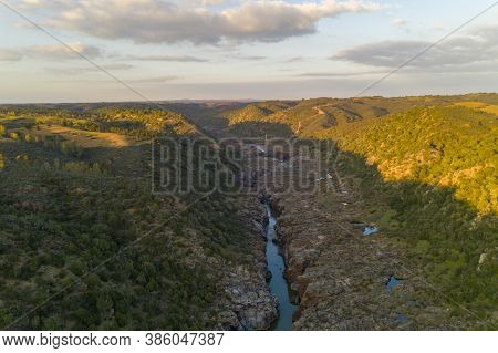 Pulo Do Lobo Waterfall Drone Aerial View With River Guadiana And Beautiful Green Valley Landscape At