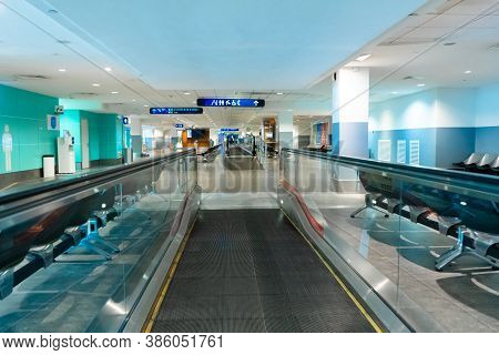 A Travelator In An Empty Airport Corridor During The Coronavirus Pandemic. Kuala Lumpur / Malaysia -