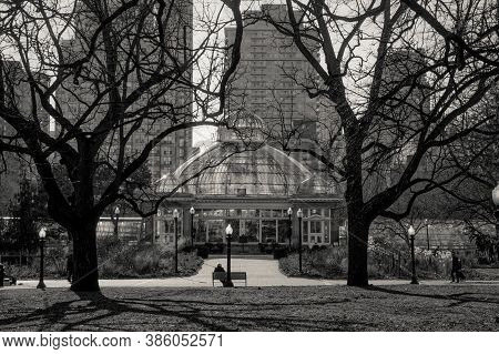 Toronto, Canada - 03 08 2020: Early Spring Sunset Allan Gardens Park View With Allan Gardens Greenho