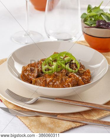 Porkolt, Typical Hungarian Beef And Onion Stew.