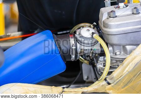 Close Up Carburetor Assembly With Body And Cylinder Head Engine Of Mini Racing Car Sport Go Kart
