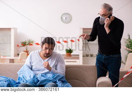 Father and son in coronavirus disease concept at home