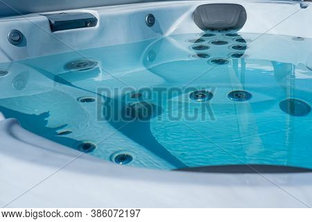 Closeup Of Water In Hot Bath Tubs At Spa. Hight Quality Photo