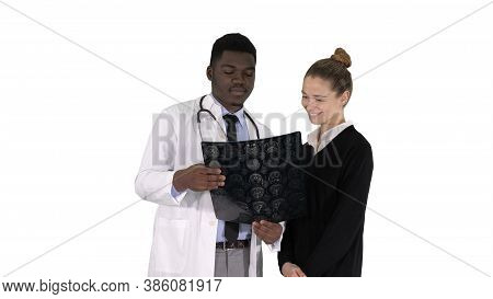 Young Woman Visiting Radiologist For X-ray Exam Of Her Brain On