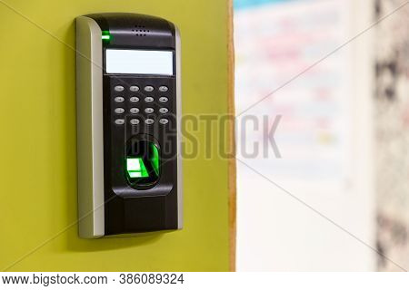 Finger Scan On Machine Security Concept And Safety. Soft Focus On Hand Scanning Finger On Machine Co