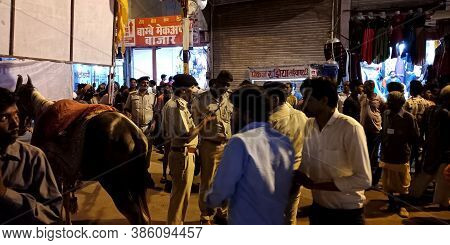 District Katni, India - August 08, 2019: Indian Police On Duty Between Traditional Public Crowd At C