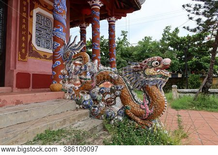Hoi An, Vietnam, September 20, 2020: Colorful Dragon On The Access Stairs Of The Van Mieu Confucius 