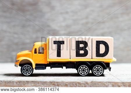 Truck Hold Letter Block In Word Tbd (abbreviation Of To Be Defined, Discussed, Determined, Decided, 