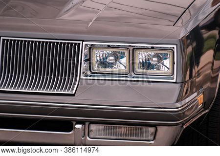 Front Part Of Exterior With Grille, Fender, Bumper, Hood, Head Lamp, Turn Light Of Grey Vintage Old 