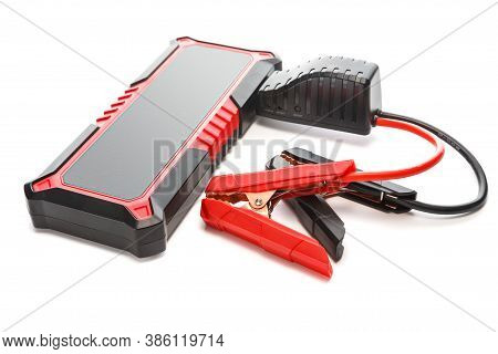 Portable Car Jump Starter. Emergency Charger Booster Power Bank Battery Isolated On White Background