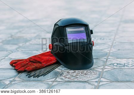 Welding Mask, Leather Gloves, Welding Electrodes, A Set Of Accessories For Arc Welding.