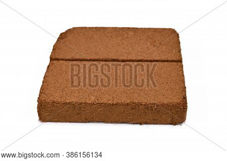 Natural Coconut Fibre Soil Pressed Into Brick Shape Isolated On White Background