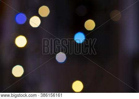 Christmas, New Year, Holiday Blurred Background From Lights Garlands In The Evening.