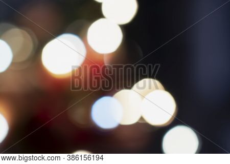 Christmas, New Year, Holiday Blurred Background From Lights Garlands In The Evening.