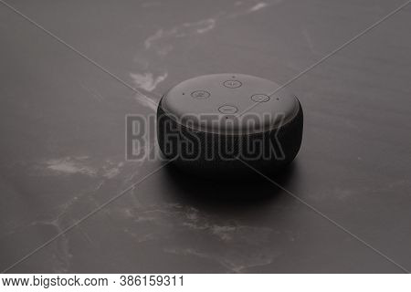 London, United Kingdom - September 20 2020: Close-up Of An Amazon Echo Dot, The Virtual Assistant Sp