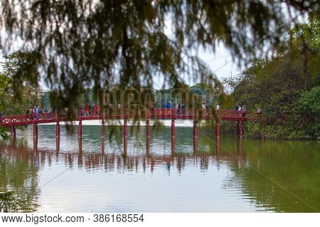 Hanoi, Vietnam - October 21, 2019 : Hanoi red bridge. The wooden red painted bridge over the Hoan Ki