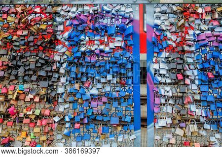 Cologne, Germany - March 26: One Of The Main Tourist Attractions Is The Colorful Love Padlocks Acros