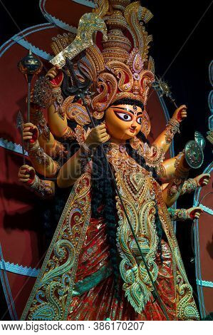 Goddess Durga Idol , Durga Puja Festival At Night. Shot Under Colored Light At Howrah, West Bengal, 