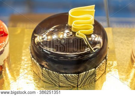 Big Round Glazed Chocolate Cake In Patisserie