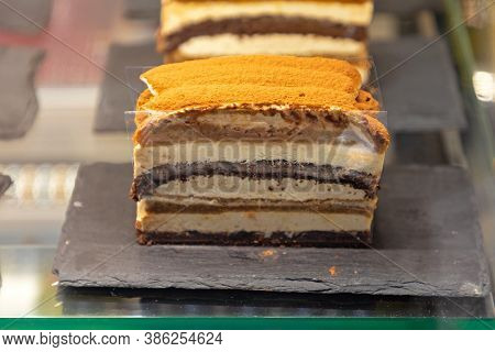Italian Cuisine Tiramisu Cake At Slate Tray