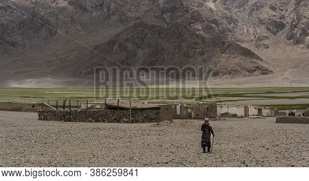 Murghab, Tajikistan - June 25, 2019: Old, Small Village Near Murghab With Abandoned Houses And A Lon
