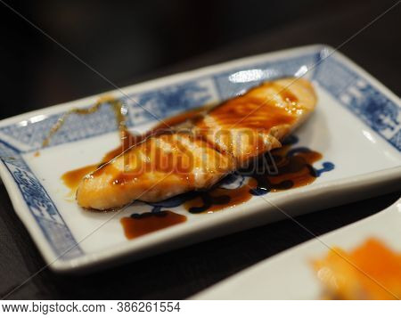 Torched Salmon Aburi Saikyo Sushi With Sweet Sauce On White Plate, Japanese Food