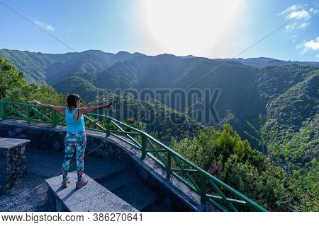 A Young Woman At The Mirador Del Parque Natural De Cubo De La Galga On The Northeast Coast On The Is