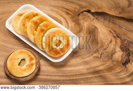 Pandequeso Traditional Colombian Food. Wood Table. Text Space