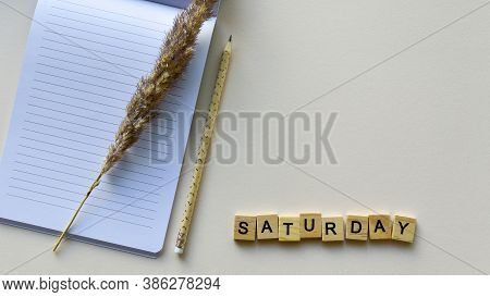 Notepad With Pencil And Wooden Word 