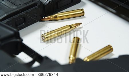 Two Rifles With Colimator Laying On The Table In Shooting Range. High Quality Photo