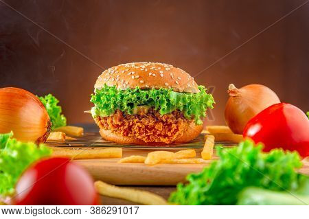 Hemberger Fried Chicken. Delicious Hamburgers, Delicious Fast Food Or Junk Food.  A Large Hamburger 