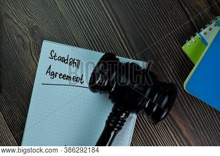 Standstill Agreement Write On A Book Isolated On Office Desk.