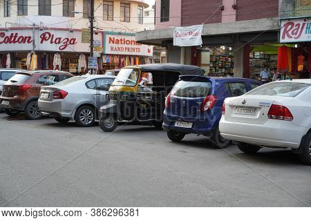 Scooters, Bikes And Cars Parked In A Market. Udaipur India - August 2020 Pwm