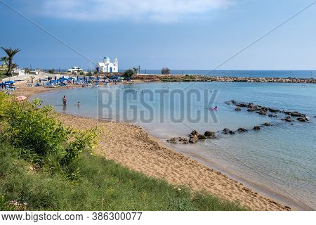 Protaras, Cyprus - August 2 2020: Idyllic Beach With Golden Sand And Turquoise Water With Tourists D