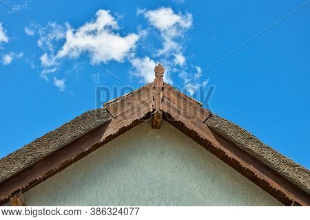 Beautiful Wooden Decoration On The Traditional Fronton House In Danube Delta Region