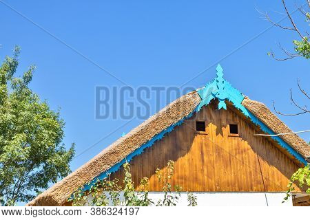 Beautiful Wooden Decoration On The Traditional Fronton House In Danube Delta Region