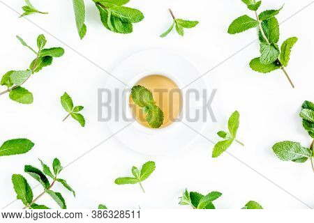 Mint Tea With Frame Made Of Mint Leaves Isolated On White Background. Set Of Peppermint. Mint Patter