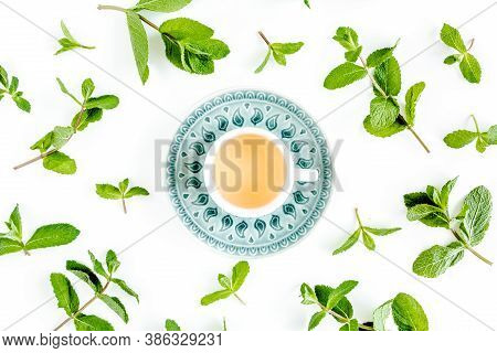 Mint Tea With Frame Made Of Mint Leaves Isolated On White Background. Set Of Peppermint. Mint Patter
