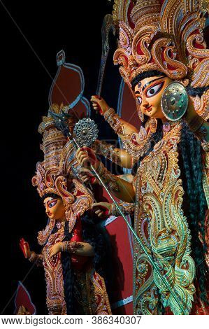 Durga And Laxmi Idol At Decorated Durga Puja Pandal, Durga Puja Festival At Night. Shot Under Colore
