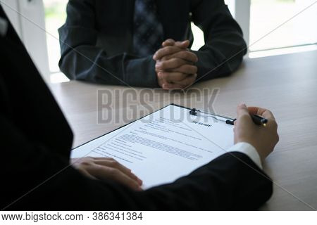 Executives Are Interviewing Candidates. Focusing On Resume Writing Tips, Applicant Qualifications, I