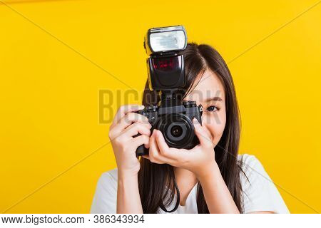 Portrait Of Happy Asian Beautiful Young Woman Photographer Smile Take Picture And Looking Viewfinder
