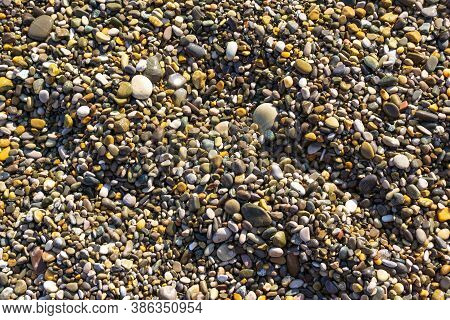 Sea Pebbles, Natural Background, Texture. Sea Background And Beach.