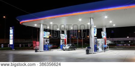 Muang, Pathumthani, Thailand Apr 26, 2018: Gas Dispenser Of Ptt Gas Station In Thailand On Dark Nigh